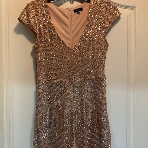 Rose gold romper size small (2-4)